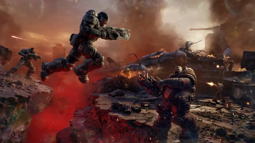 Бойцы перепрыгивают препятствие на поле боя — Gears of War: E-Day