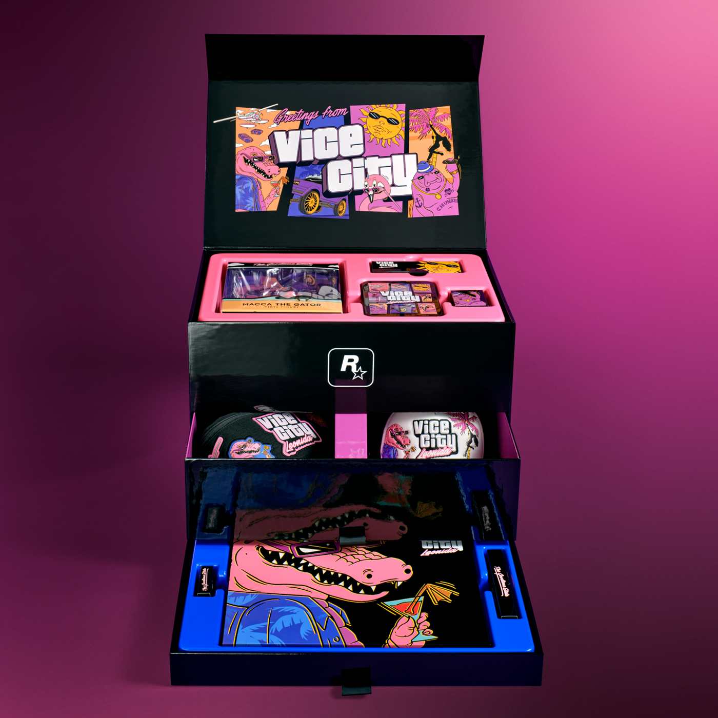 Открытая коробка GTA VI Vice City Collection с выдвижными отделениями, кепкой и мерчем с аллигатором