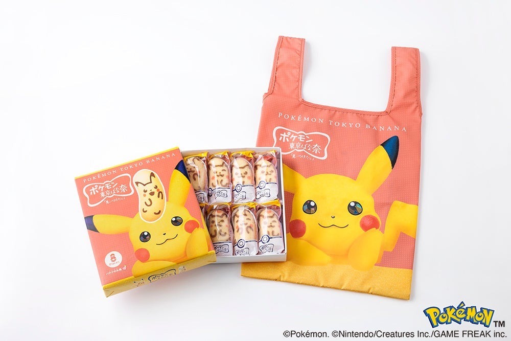 Розово-жёлтая сумка с Пикачу рядом с открытой коробкой из восьми пирожных Pokémon Tokyo Banana