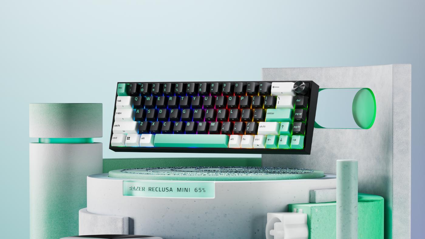 Клавиатура Razer Reclusa Mini 65% с чёрными, белыми и бирюзовыми клавишами, RGB-подсветкой и колёсиком справа